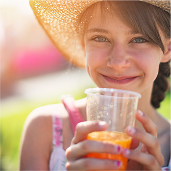 girl with glass of juice