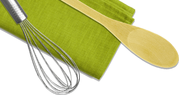 Spatula and whisk on mat